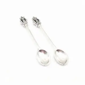 Metal spoon silver crown design